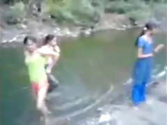 Indian girl in river with theri bfs